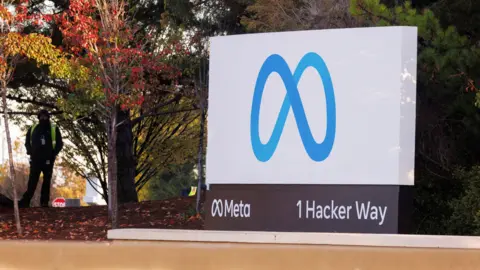 The blue Meta logo, which looks like an infinity sign, outside Meta's HQ