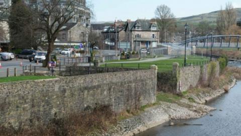 Western side of the riverbank of the River Kent in Kendal town centre