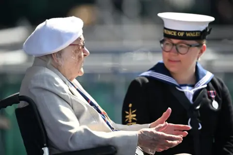 Leon Neal/Getty Images  Veteran  and a member of the armed services