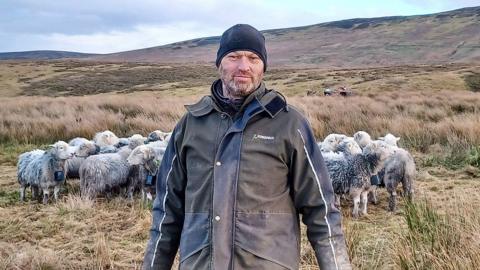 Ian Bell with his Herdwick sheep