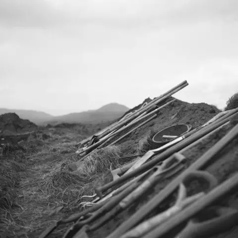 Terry Sommer Tools laid out in a row at the archaeological site