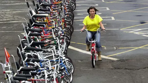 PA Media Woman riding Raleigh Chopper bike in 2004