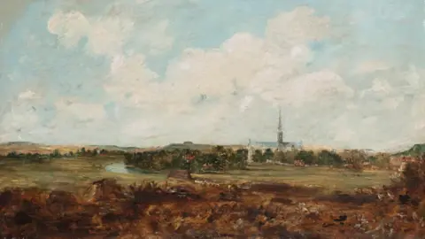 Image shows John Constable's oil painting titled 'View from Salisbury to Harnham'. The landscape painting depicts Salisbury Cathedral, the River Avon and the surrounding water meadows