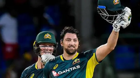 Tim David celebrates for Australia