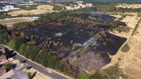 Nottinghamshire Fire and Rescue Service A field damaged by a fire