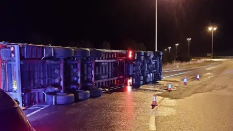M40 slip road overturned lorry