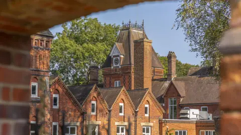 A shot of the orange brick Victorian buildings at Rayners Penn