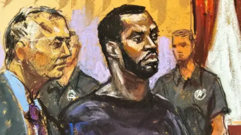 Getty Images Sean "Diddy" Combs and defense attorney Marc Agnifilo stand before U.S. District Judge Robyn Tarnofsky after prosecutors filed three criminal charges against him in federal court in Manhattan, New York, U.S., September 17, 2024 in this courtroom sketch.