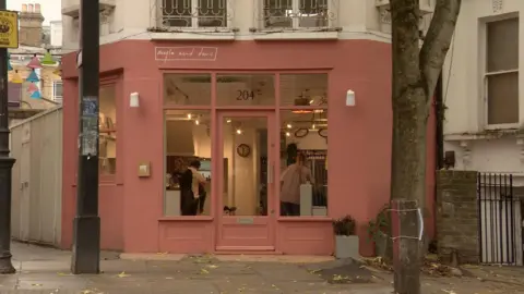 An exterior shot of a hair salon