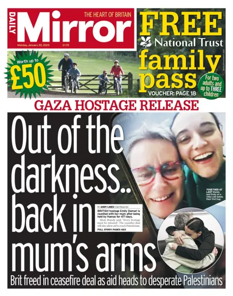 "Out of the darkness...back in mum's arms," is the main headline on the front page of the Mirror. 