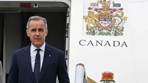 Carney seen landing in Australia on Tuesday