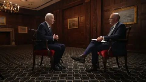 Biden sits opposite the BBC's Nick Robinson