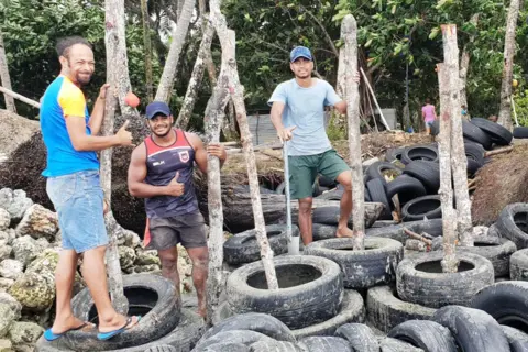 Sireli McGoon A tyre wall in the coastal village of Togoru, Fiji