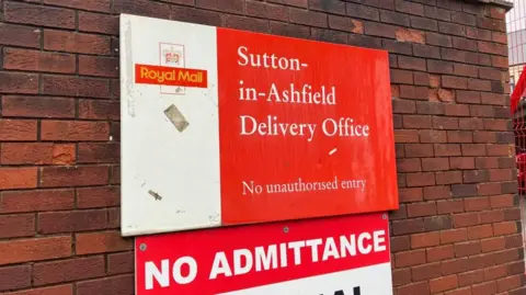 Royal Mail red signage of Sutton-in-Ashfield delivery office
