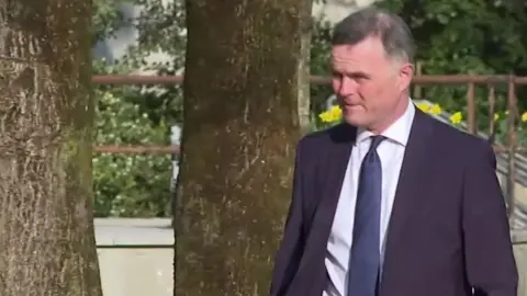 Evan Williams arriving at court 