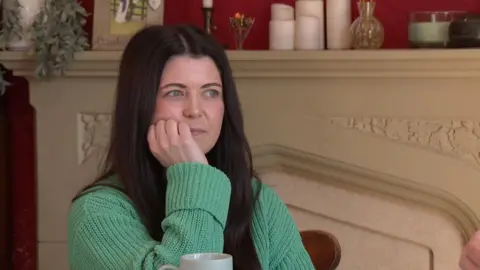 Helen Jenner, who is seen wearing a green jumper