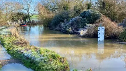 Essex County Fire & Rescue Service A car stuck in flood water in Little Baddow, Chelmsford