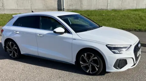 Marie McCallum A white Audi