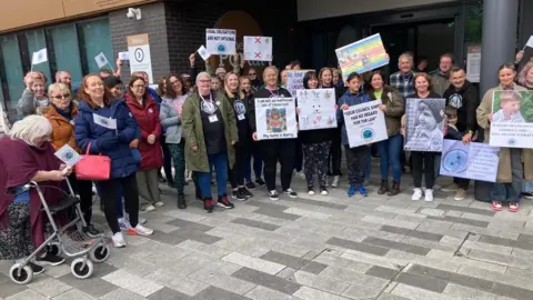 BBC The CWaC SEND Accountability group at the protest