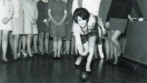 Yate Heritage Centre A woman bowling a ball in the social club