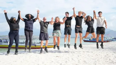 Studio Lambert All finalists from Race Across The World on a beach