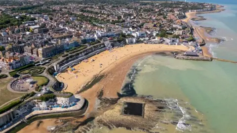 An aerial view of the Broadstairs coast, showing beaches and the sea at low tide.