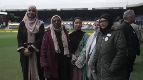 Ant Saddington/BBC A group of women attending the Iftar event at Kenilworth Road