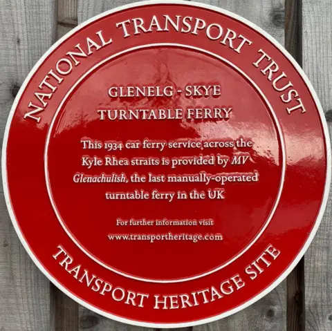 Red Wheel plaque