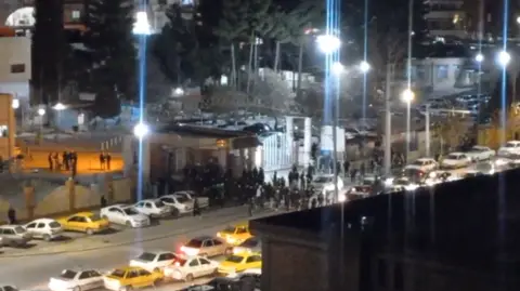 Vahid Online Screengrab of showing security forces storming the Imam Khomeini Hospital in the predominantly Kurdish city of Ilam, where activists said wounded protesters had been sheltering (4 January 2026)