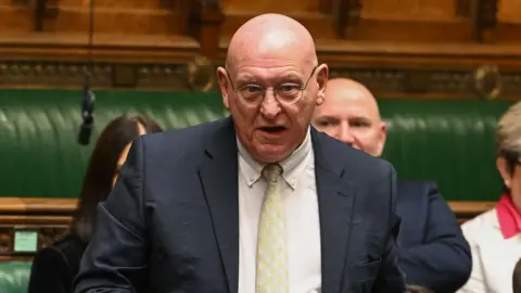 UK Parliament Hywel Williams standing up in the House of Commons