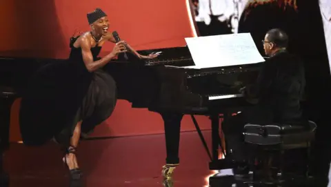 Reuters Cythnia Erivo singing as Herbie Hancock plays piano at the 67th Grammy Awards