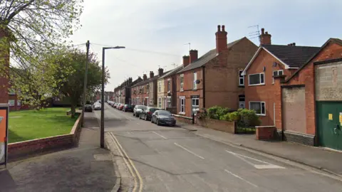Bennett Street in Long Eaton featuring terraced houses and on-street parking 