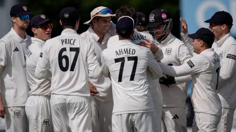 Gloucestershire celebrate taking wicket