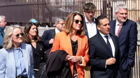 PA Media The parents of Barnaby and Grace 