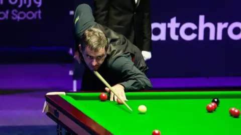 Ronnie O'Sullivan in action at the inaugural Saudi Arabia Masters.