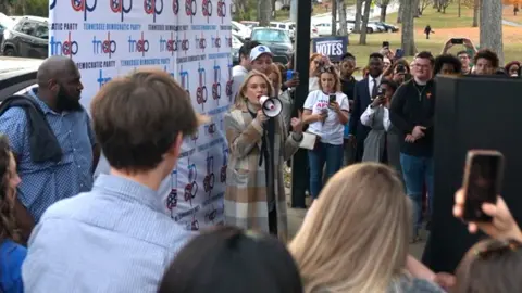 Image shows the Democratic candidate canvassing