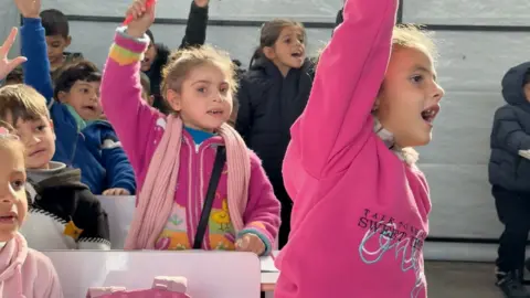 BBC Children study in a classroom in Gaza