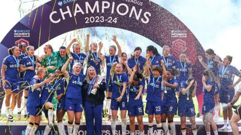 Chelsea team celebrate winning the Womens Super League.