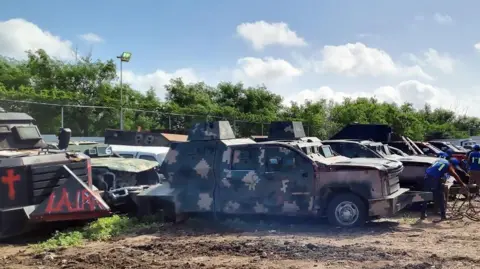 Mexican Federal Prosecutor's Office View of monster trucks about to be destroyed