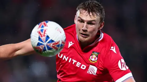 Sam Dalby in action for Wrexham