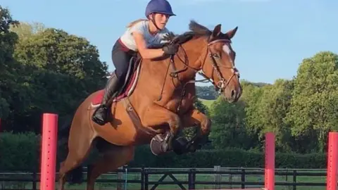 Mental health Mum s horse statue trek after daughter s suicide