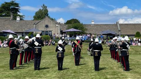 The Royal Marines Band Collingwood performing on the front Lawn of Dorothy House in Winsley near Bradford-on-Avon.