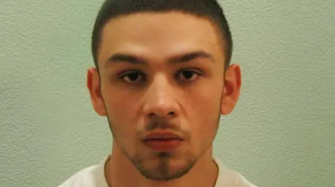 Metropolitan Police/PA Wire A mugshot of Jake Fahri.