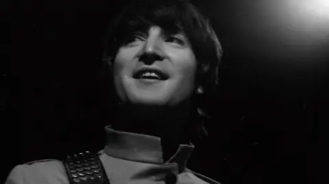 John Lennon appearing on Top Of The Pops in 1965