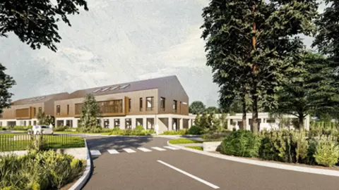 A computer-generated image of the new Lisnaskea Health Centre. It shows a brown and white building surrounded by trees and bushes.