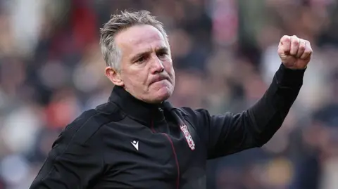 Wrexham manager Phil Parkinson celebrates