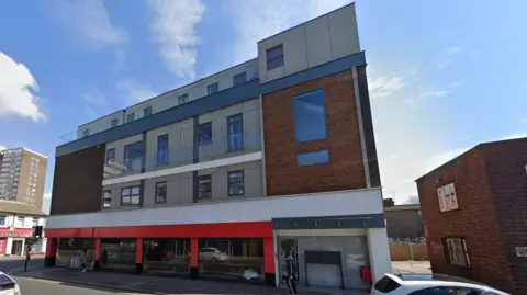 Google The building on Chichester Road in Southend-on-Sea. It is four storeys high and there is brickwork and cladding visible. There appears to be a vacant commercial unit on the ground floor.