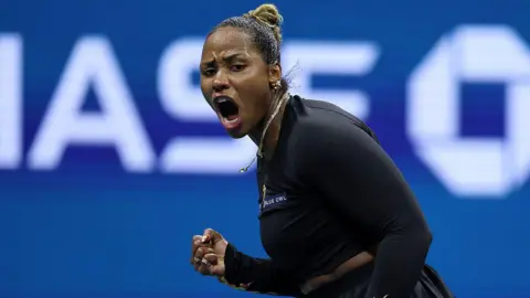 Getty Images US tennis star Taylor Townsend clenches her first in response to a match against Mirra Andreeva in New York City, during the 2025 US Open