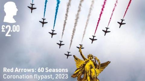 A stamp showing the Red Arrows during the 2023 Coronation flypast 