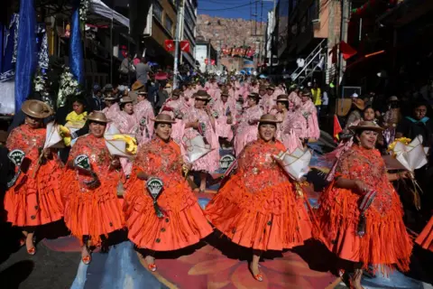 Gaston Brito/Getty Images Women dance Morenada during Festival of the Great Power            